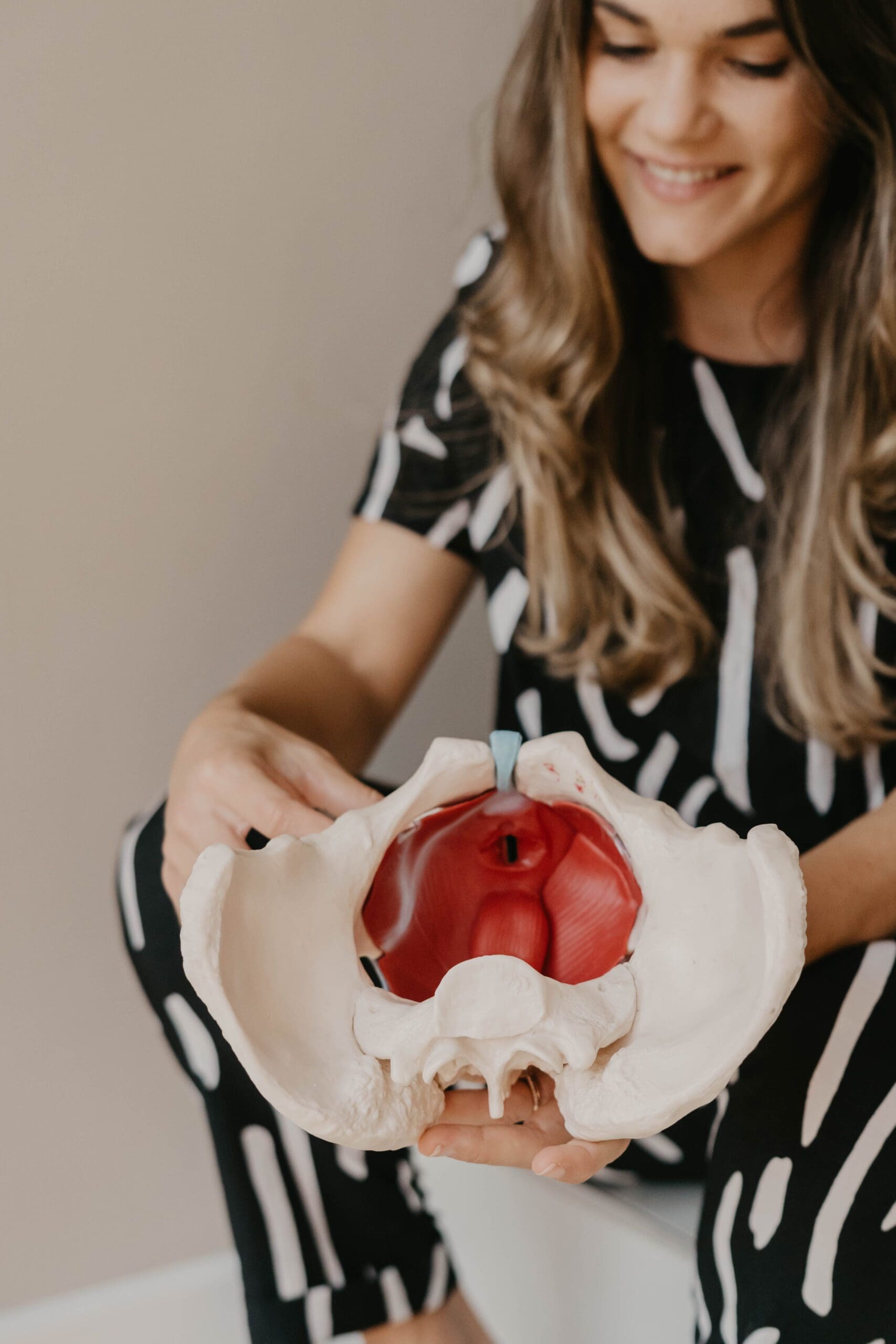 Holding Pelvic Skeleton