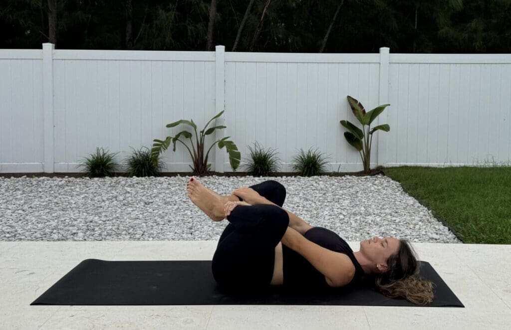 Happy Baby Pose frog variation to relax the pelvic floor