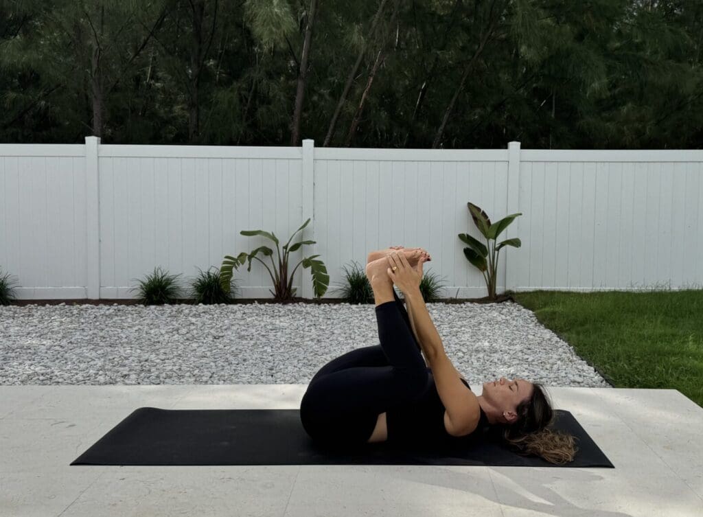 Happy Baby pose to relax the pelvic floor